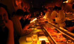 A view of the sushi bar from our seats, with Morimoto and his sushi staff slicing away